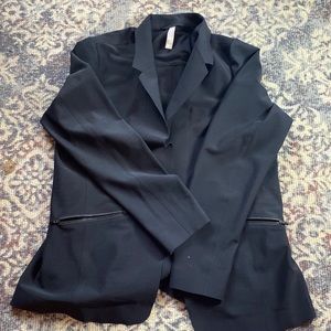Athleta size 16, no tags; excellent blazer and great for traveling